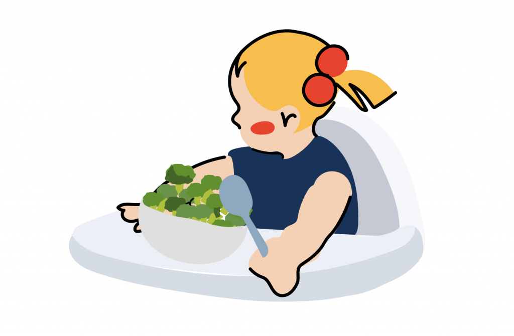 A young blond girl sits in her baby chair, eating healthy snacks like broccoli. 