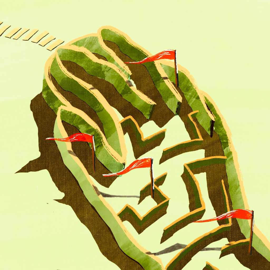 A maze in the shape of a hand holding a mouse. 
