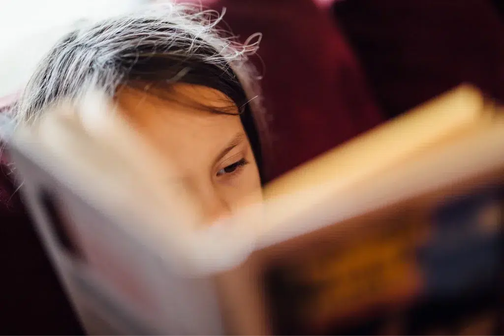 a girl reading a book