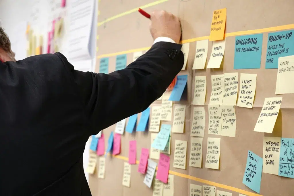 sticky notes on the corkboard