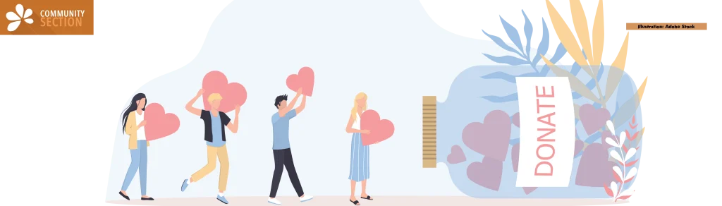 Donation concept. Little people holding hearts as a metaphor of philanthropy.